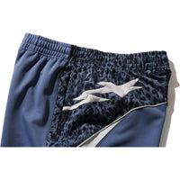 WILD LEOPARD PATTERN OVERSIZED FIT TRACK PANTS MENS