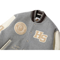 BAPE X HIGHSNOBIETY MULTI LOGO VARSITY JACKET MENS