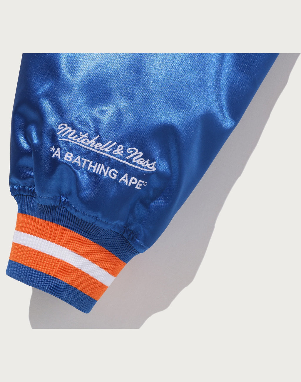 BAPE X M&N NBA - NEW YORK KNICKS SATIN JACKET MENS