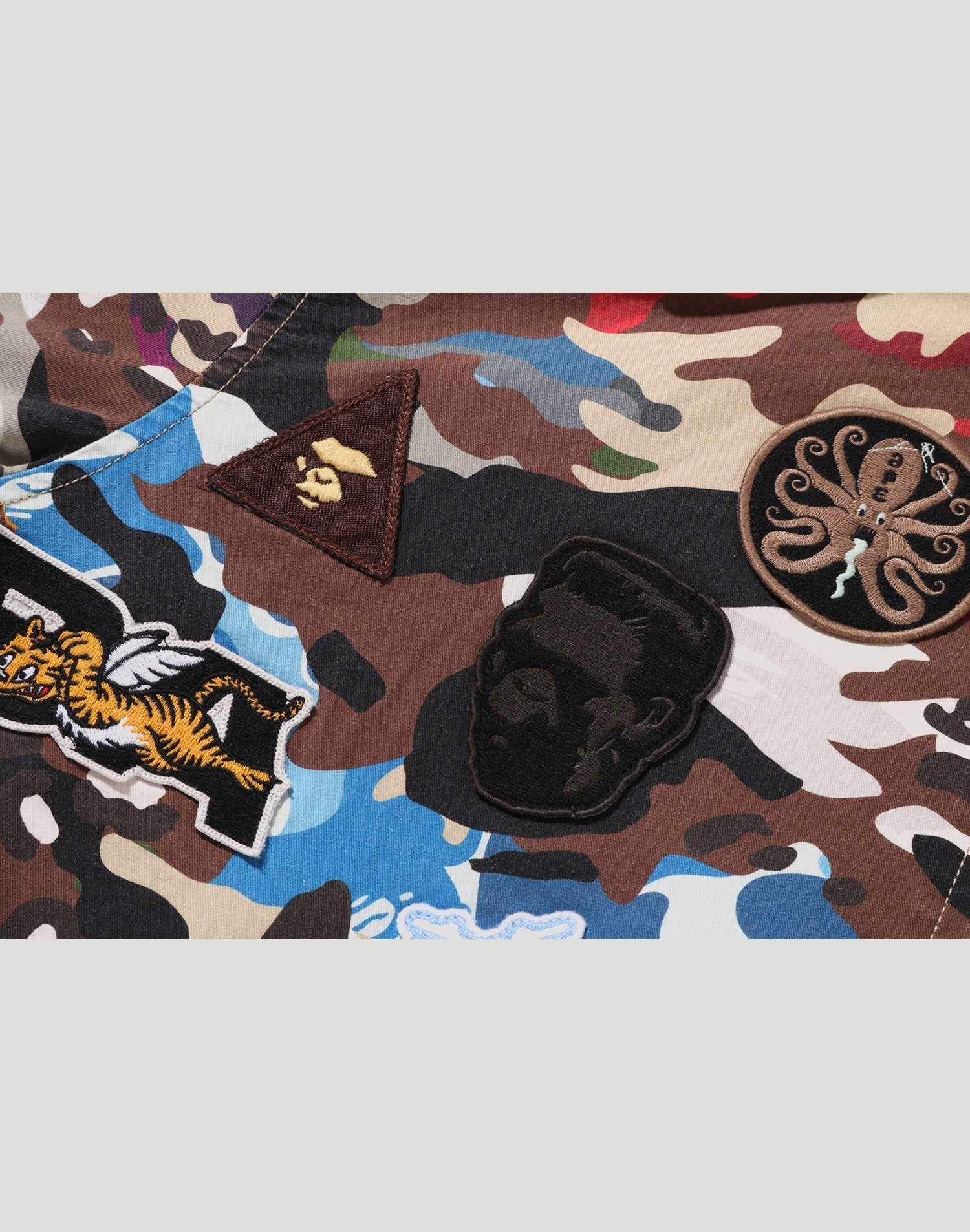 HYBRID CAMO MULTI BADGE JACKET MENS