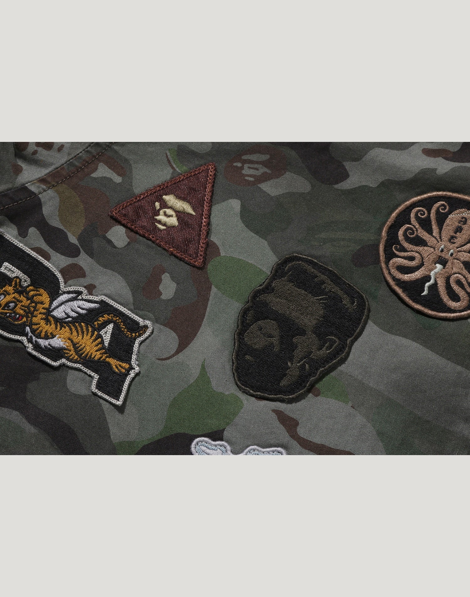 HYBRID CAMO MULTI BADGE JACKET MENS