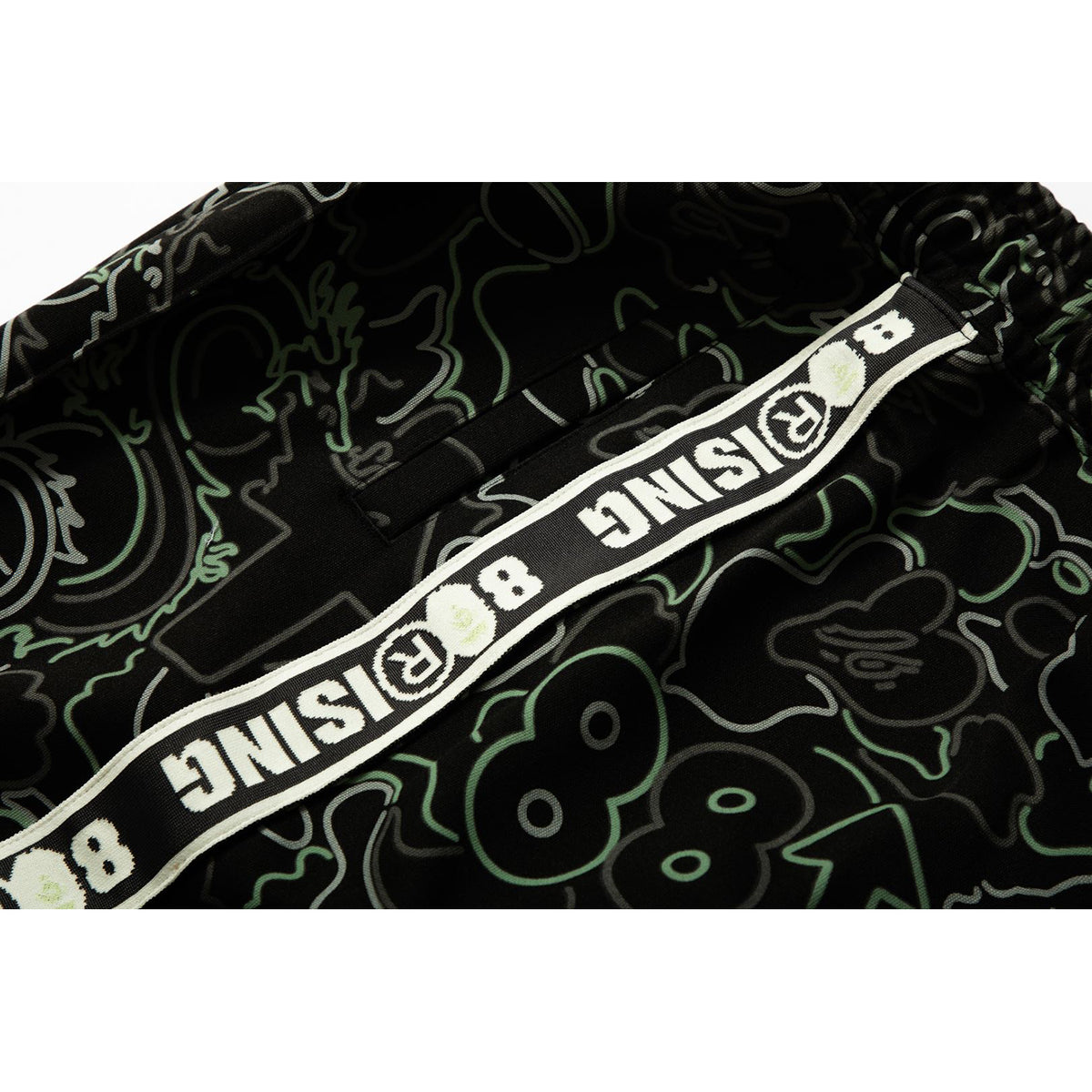 BAPE X 88RISING GLOW IN THE DARK CAMO TRACK PANTS MENS