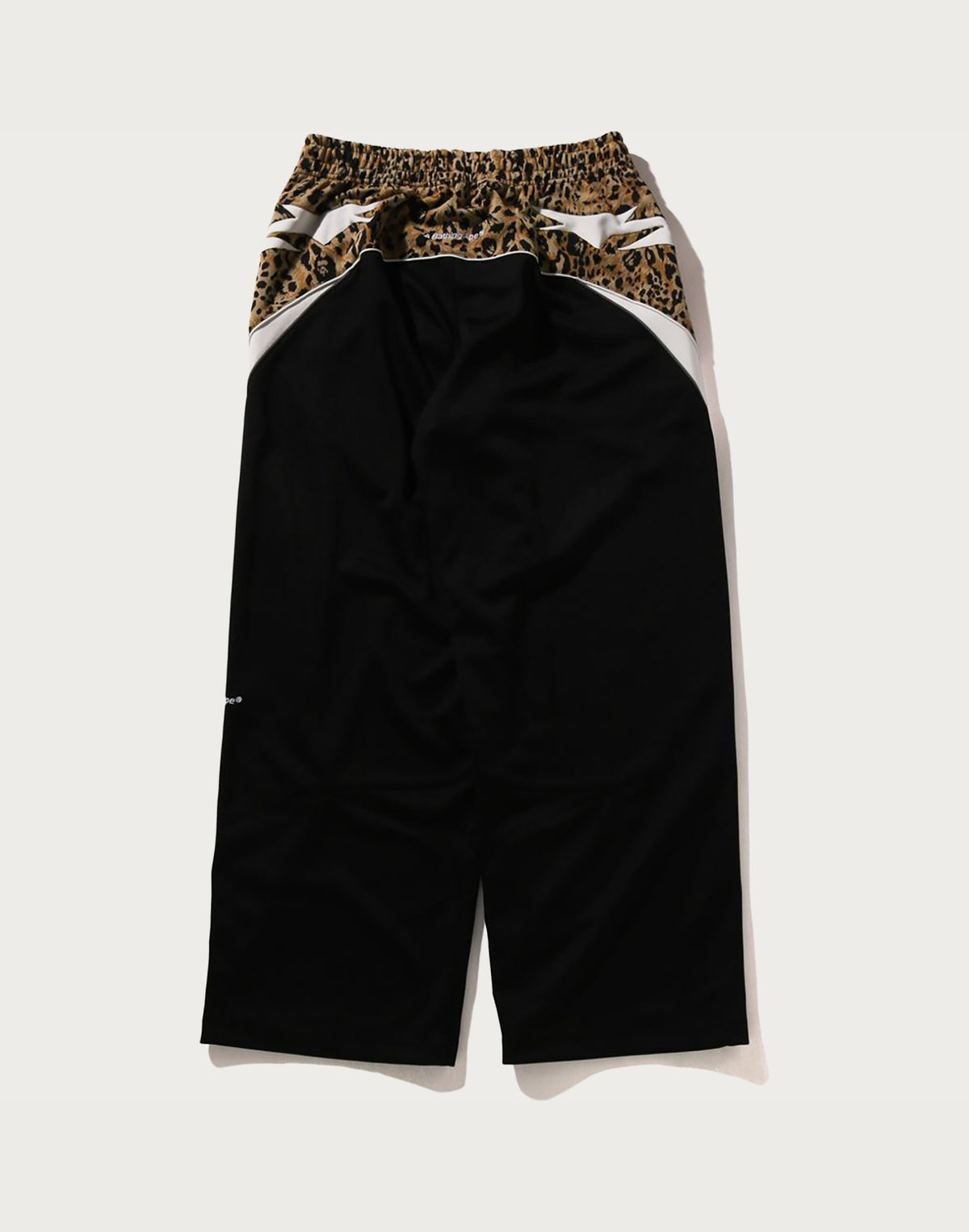 WILD LEOPARD PATTERN OVERSIZED FIT TRACK PANTS MENS