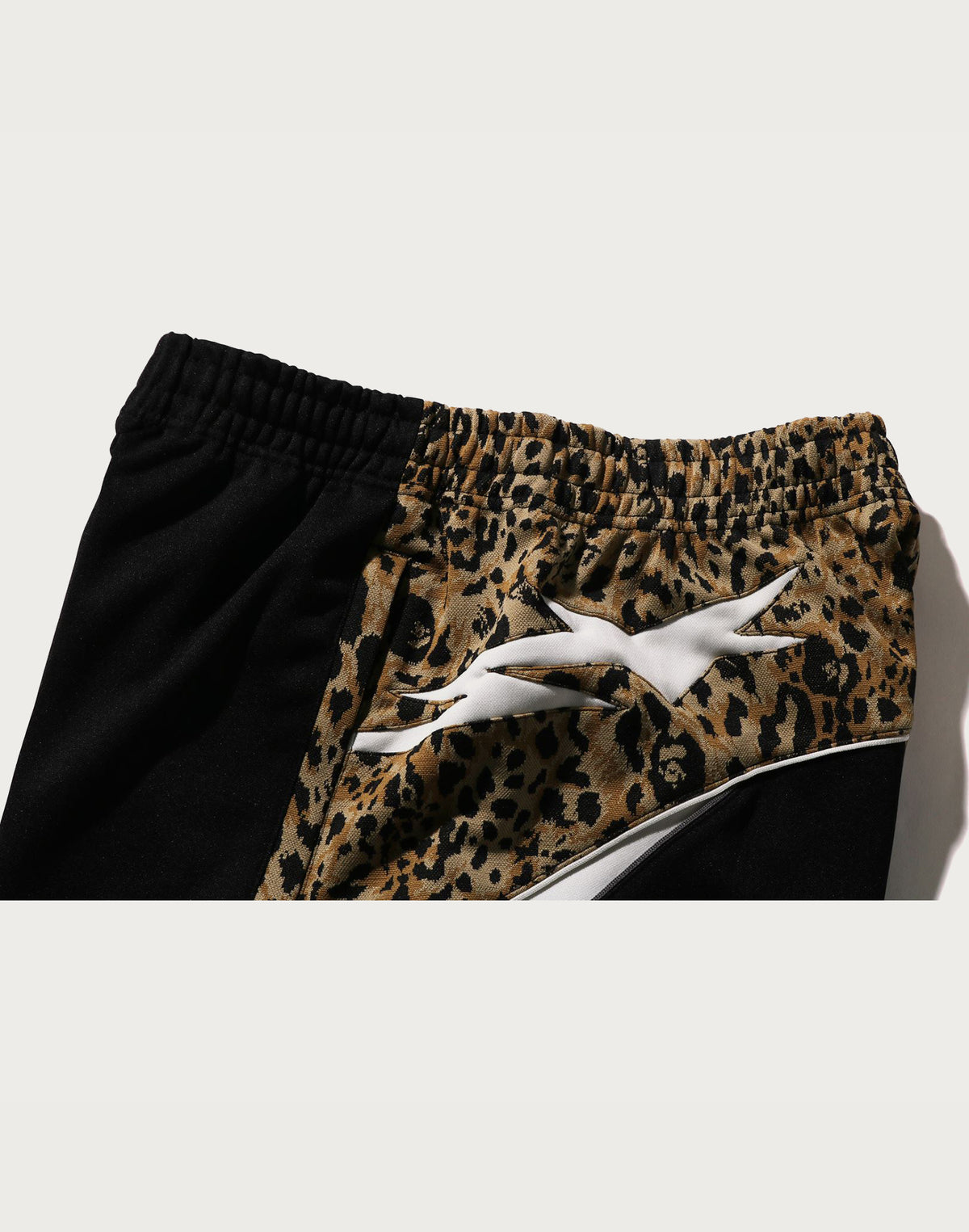 WILD LEOPARD PATTERN OVERSIZED FIT TRACK PANTS MENS