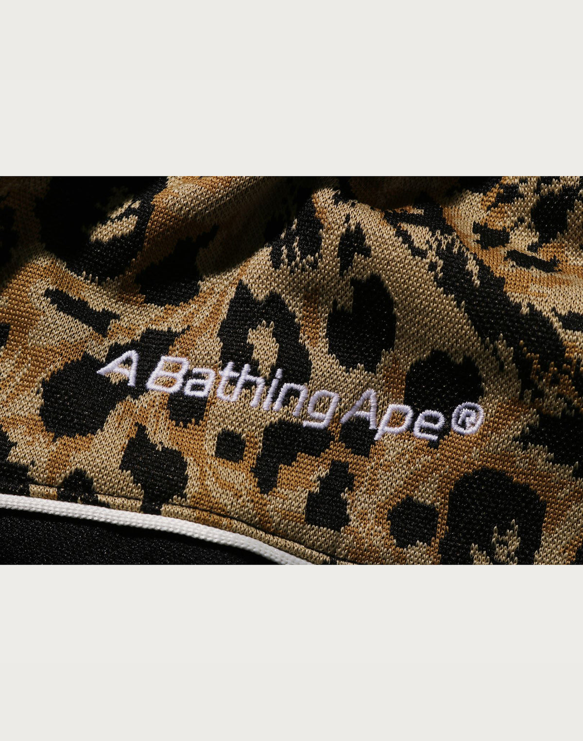 WILD LEOPARD PATTERN OVERSIZED FIT TRACK PANTS MENS