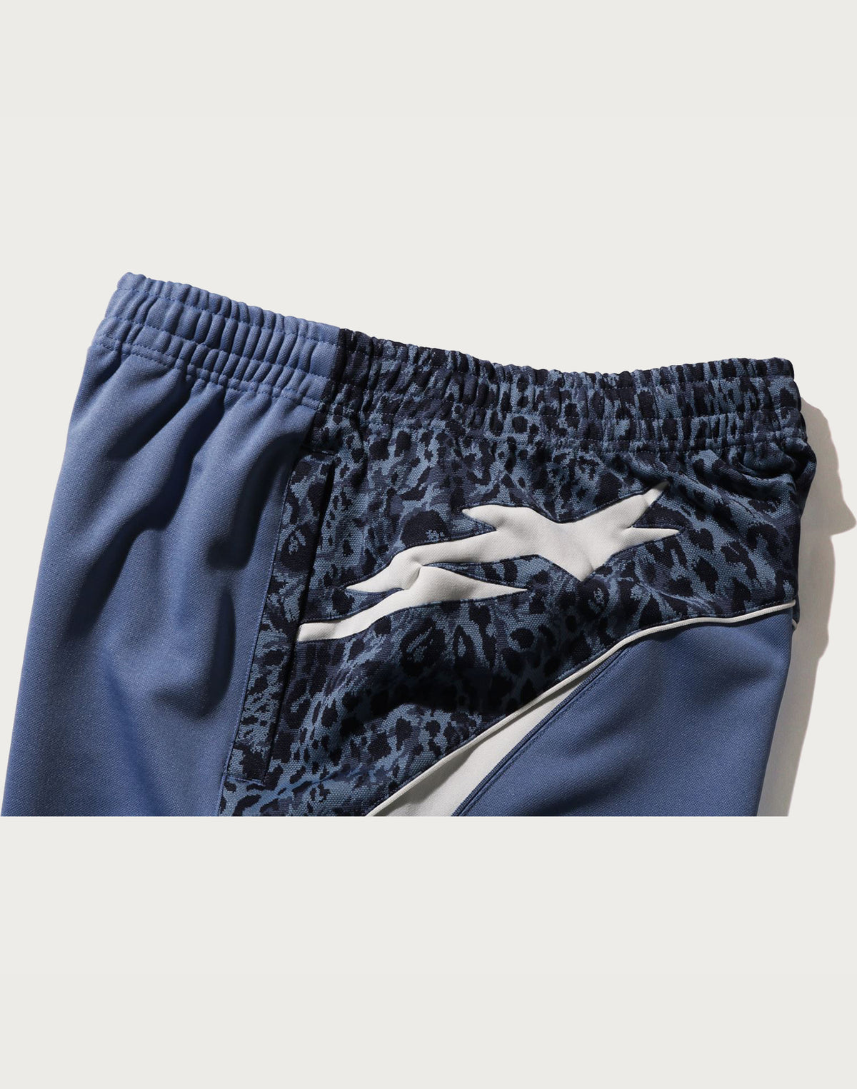 WILD LEOPARD PATTERN OVERSIZED FIT TRACK PANTS MENS