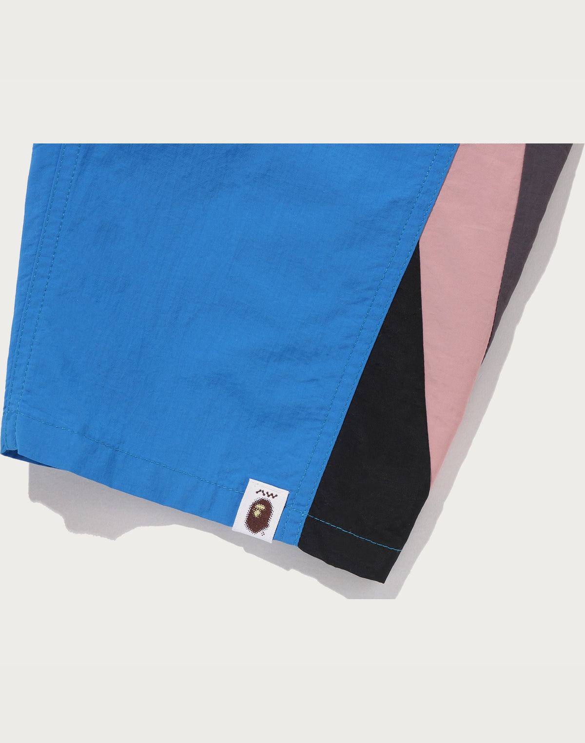 BAPE BY KAZUKI KURAISHI NYLON TRACK PANTS MENS