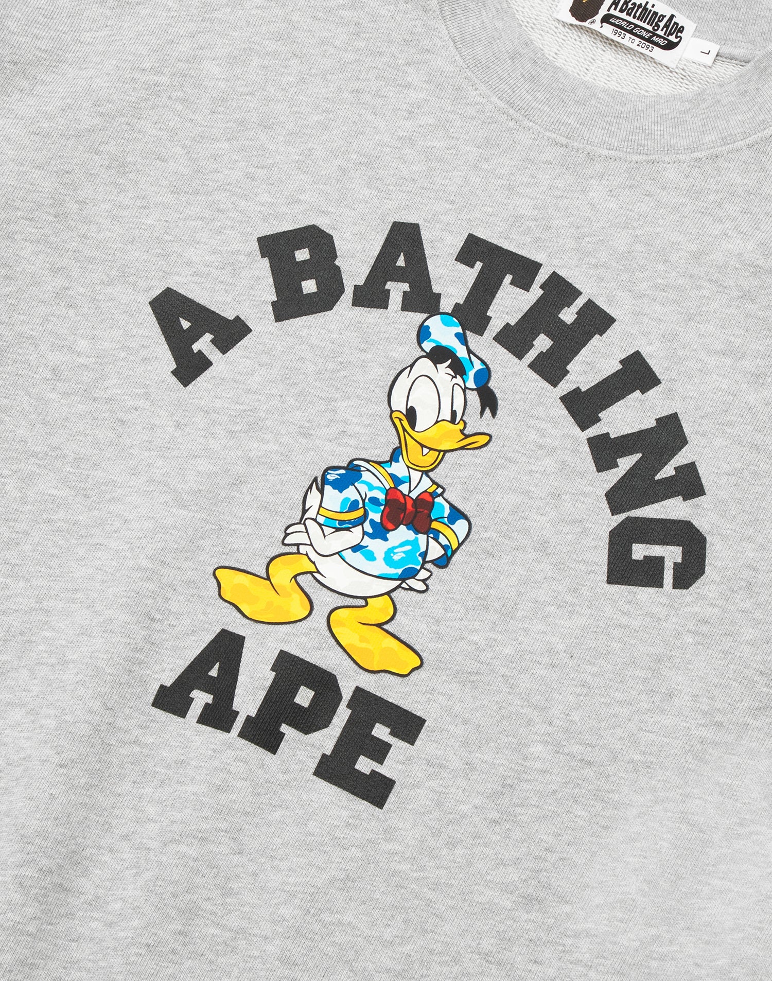 BAPE X DISNEY DONALD DUCK COLLEGE RELAXED FIT CREWNECK MENS